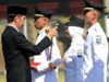 Presiden saat menjadi Inspektur Upacara pada Pelantikan 1.456 calon Pamong Praja Muda angkatan XXV lulusan tahun 2018 di IPDN Jatinangor, Sumedang, Jawa Barat, Jumat (27/7). (Foto: Humas/Rahmat)