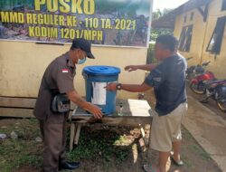 Anggota Satgas TMMD 110/ Kodim 1201 Bersama Perangkat Desa Ajak Warga Perketat Prokes