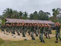 Anggota Satgas TMMD 110/ Kodim 1201, Regangkan Otot Sebelum Mulai Kegiatan