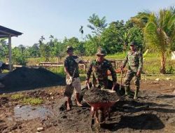 Satgas TMMD dan Warga Laksanakan Pengurukan Tanah