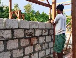 Penyusunan Batu Tela Pembangunan Gereja Kampung Dorba