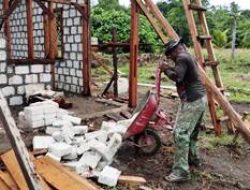 TMMD: Distribusi Batu Tela di Pembangunan Gereja dan Rumah Pastori