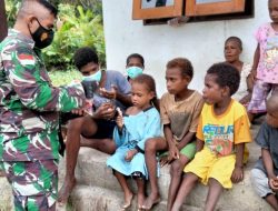 Kedekatan Anggota Satgas TMMD dengan Anak-anak