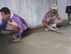 Pengecoran Lantai Luar dan Dalam Bangunan Rumah Pastori TMMD Kodim Sarmi