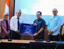 Pemko Solok Bersama BNI Serahkan 100 Paket Bantuan