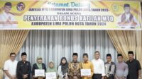 Pemkab Limapuluh Kota Serahkan Bonus Juara Umum MTQ ke-40