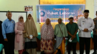 TP-PKK Kota Solok Serahkan Bantuan Paket Lebaran Untuk Keluarga Kurang Mampu