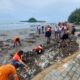 sinergi-kodaeral-ii-dan-pemko-padang:-pantai-air-manis-dibersihkan,-100-pohon-kelapa-hibrida-ditanam