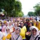 hgn-dan-hut-pgri-ke-80,-ribuan-guru-se-tanah-datar-ikuti-gerak-jalan-jantung-sehat