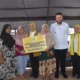 Pemerintah Kota Padang menerima bantuan dari Dharma Wanita Persatuan (DWP) Kementerian Energi dan Sumber Daya Mineral (ESDM) Republik Indonesia bagi masyarakat terdampak bencana yang berada di Hunian Sementara Perumahan Nelayan Koto Tangah, Senin (22/12/2025).
